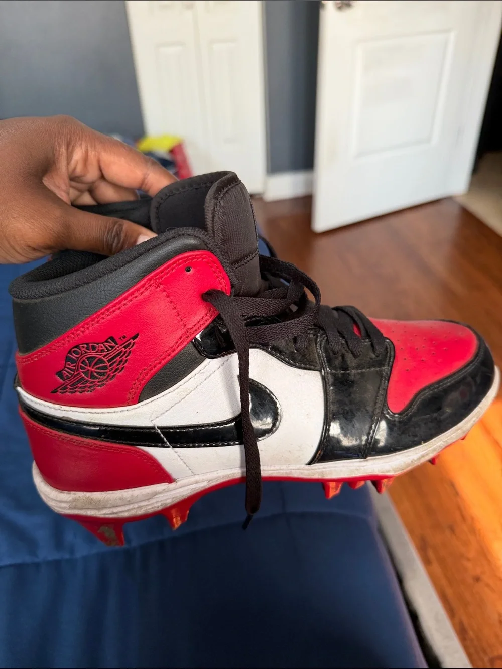Jordan men’s High-Top CLEATS in Red, Black & White